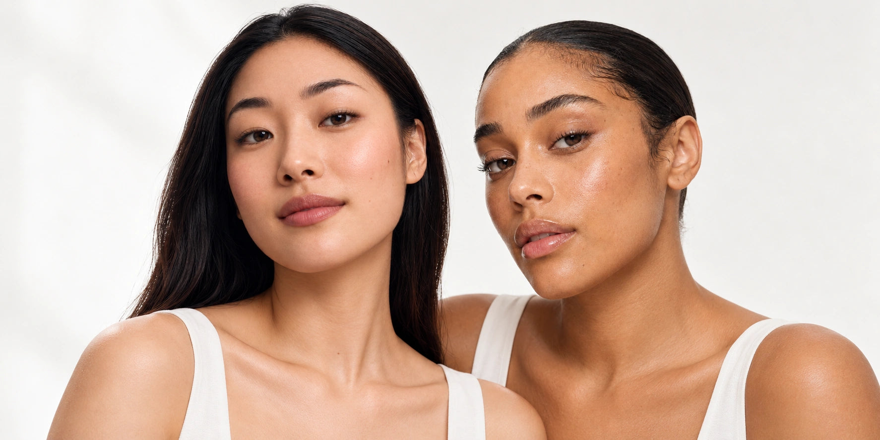 Two models posing together for Noove skincare